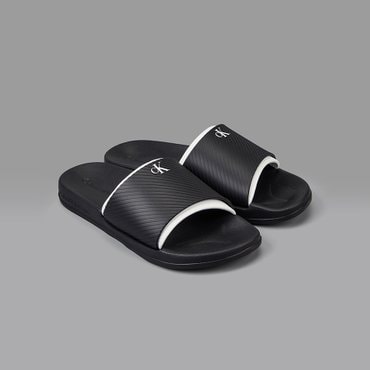 Calvin Klein Jeans ACC 남성 노리치 슬라이드(YM01234-0GM)