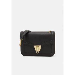 4461999 Coccinelle MARVIN TWIST - Handbag noir