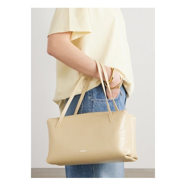 미디엄 가죽 토트 크림 1647597348996703