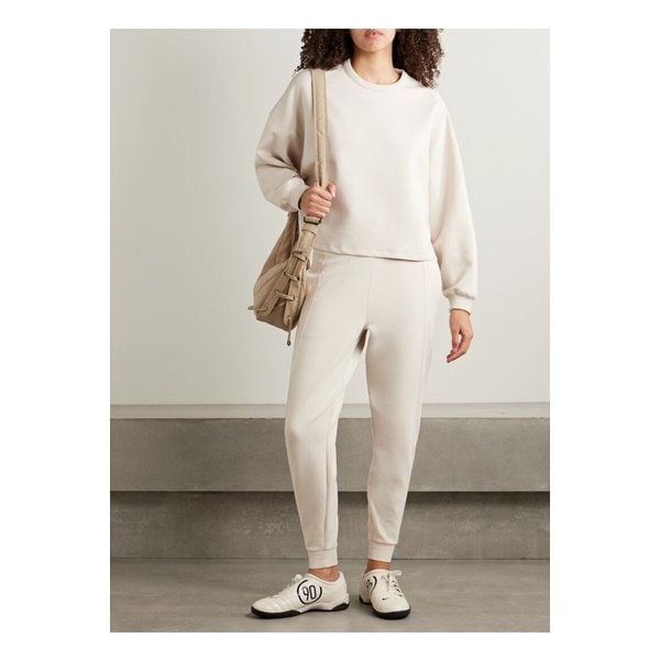 드라이핏 테이퍼드 트랙 팬츠 아이보리 1647597360163535