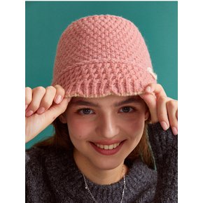 Soft pink knitted bucket hat