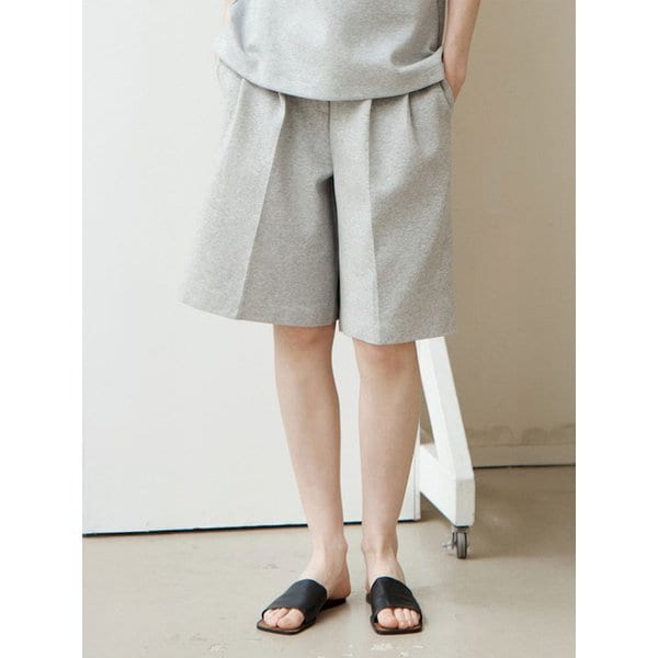 터크 와이드 쿠션 하프 팬츠