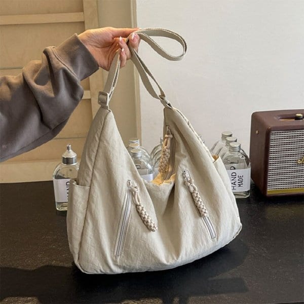 [옷자락] 여자 대학생 솔방울끈 바스락 멀티포켓 크로스 숄더백