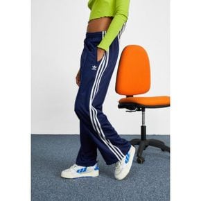 4781815 adidas FIREBIRD LOOSE - Tracksuit bottoms dark blue