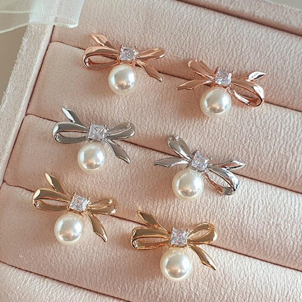 [옷자락] 여성 러블리 진주알 큐빅 리본 실버 패션 귀걸이