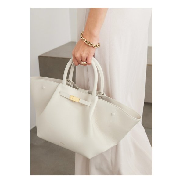 드멜리어 뉴욕 미디 텍스처 가죽 토트 화이트 1647597357778884