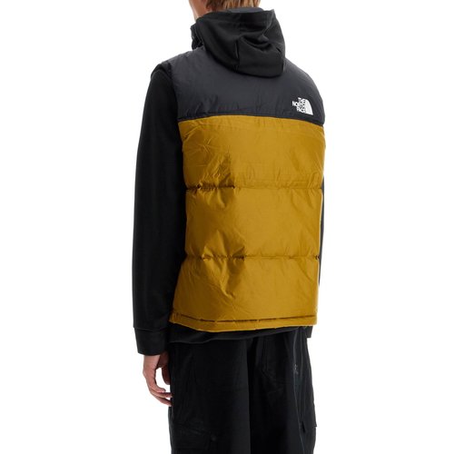 The North Face 1996 레트로 눕시 푸퍼 베스트 SPD0B7763