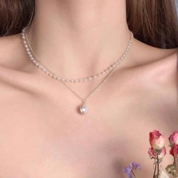 [옷자락] 여성 사계절 데일리 포인트 진주 레이어 목걸이