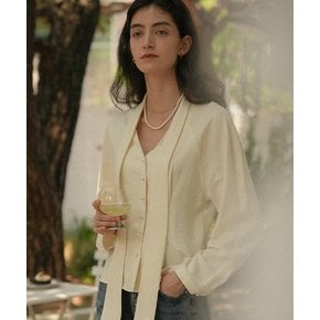 Tied collar pearl button flare blouse_Butter