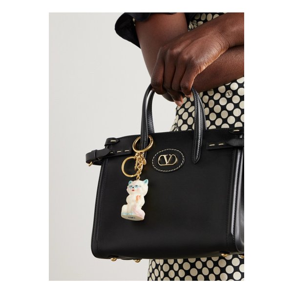 르 샤 드 라 메종 골드톤 레진 백 참 46376663162845452