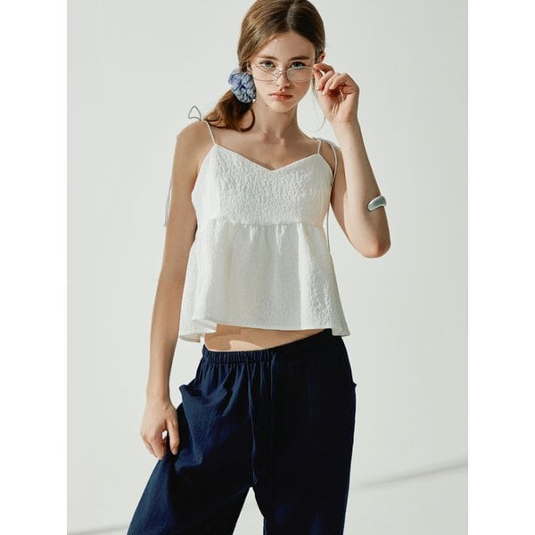 네이핀 텍스쳐 리본 슬리브리스 탑