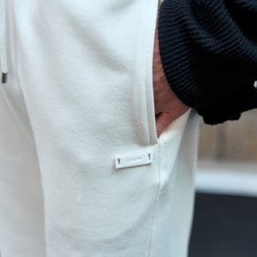 [정상가148,000원] 코튼 라인 스웨트 팬츠 아이보리