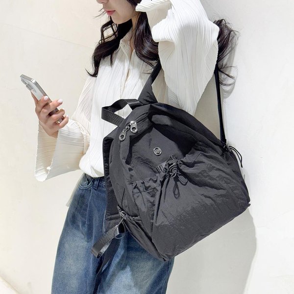 [옷자락] 여자 심플 나일론 스트링 포켓 경량 캐주얼 백팩
