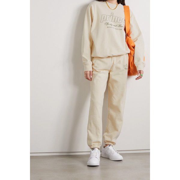 + Prince Printed Cotton-jersey Track Pants 크림