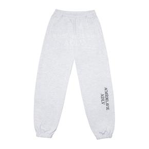 ESSENTIAL LOGO PANTS MELANGE - 에션셜 로고 팬츠