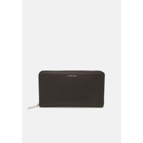 4389424 Calvin Klein MUST XL ZIP AROUND WALLET - Wallet black 73184702