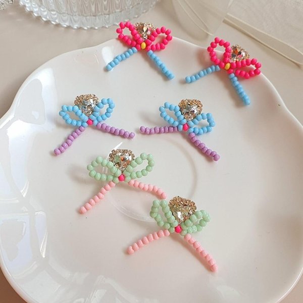 [옷자락] 여자 리본 패션 비즈 스터드 블링 큐빅 귀걸이