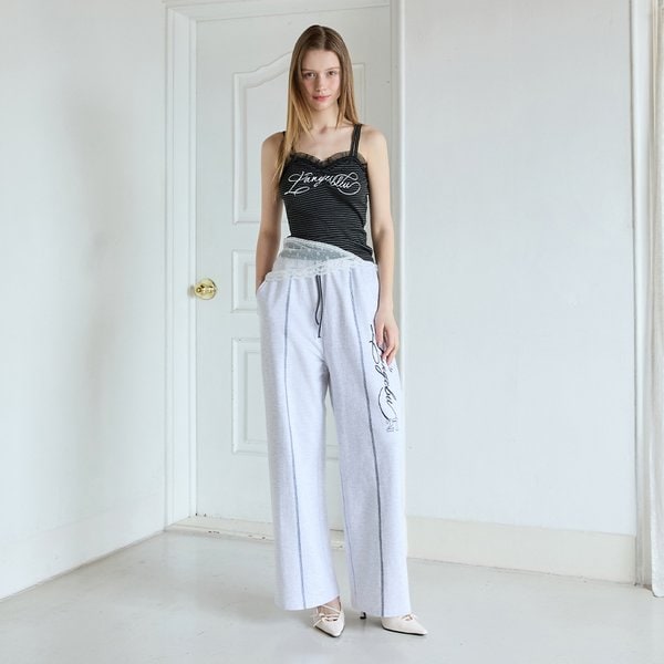 [시흥점] 여성 레이스 러플 장식 슬리브리스 (ES2OTH58)