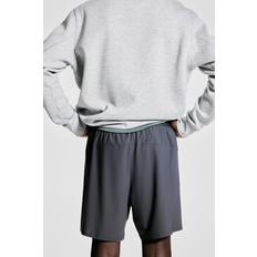 2-in-1 4부 스포츠 쇼츠 DryMove™ 다크 그레이 1229422003