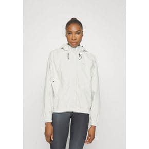 5058202 Nike SWIFT - Running jacket pale ivory/black/silver