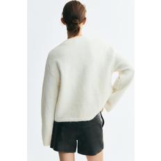 브러시트 가디건 크림 1359579002